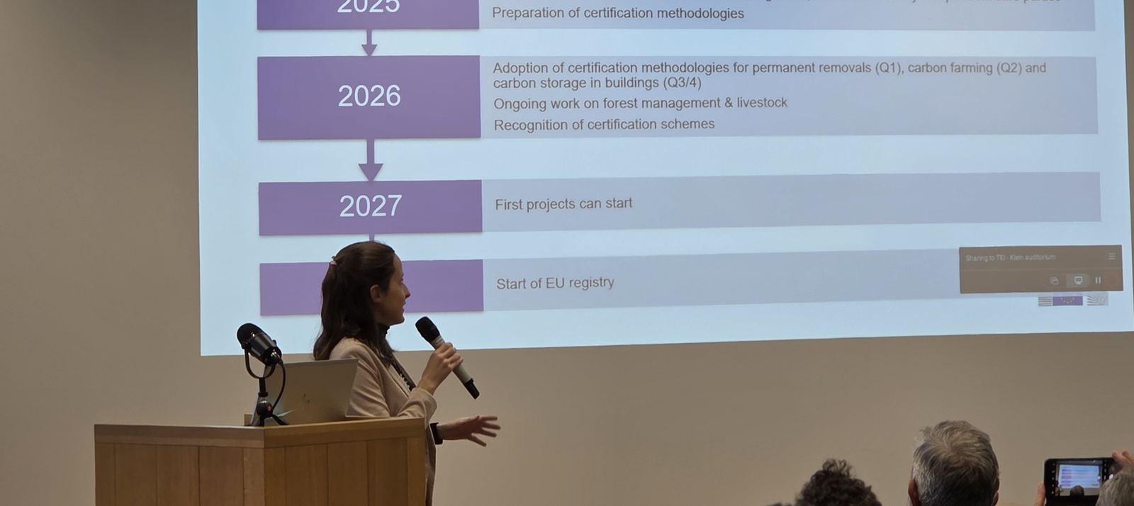 A European Commission speaker presenting the CRCF implementation timeline to the audience at the Actiedag in Brussels